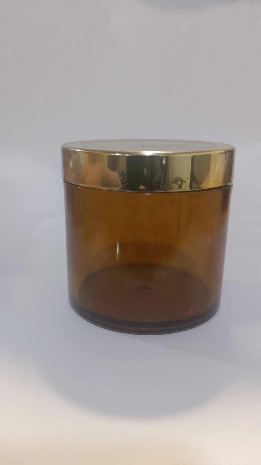 CP7242 100 gm amber san jar with Golden cap